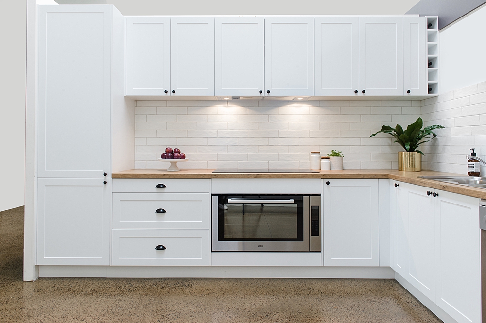 Shaker white kitchen with timber laminate benchtop